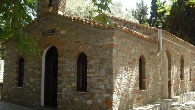 Detailed stonework and arched doorways of the historic Agia Paraskevi chapel close to our Skiathos apartments.